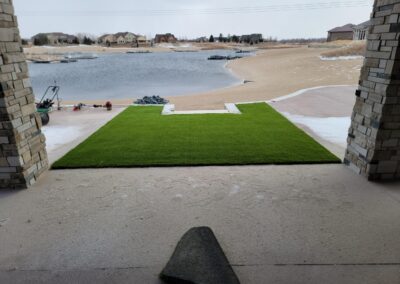 synthetic turf patio with view of lake